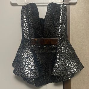 Black halter top, with silver accents, deep v slit